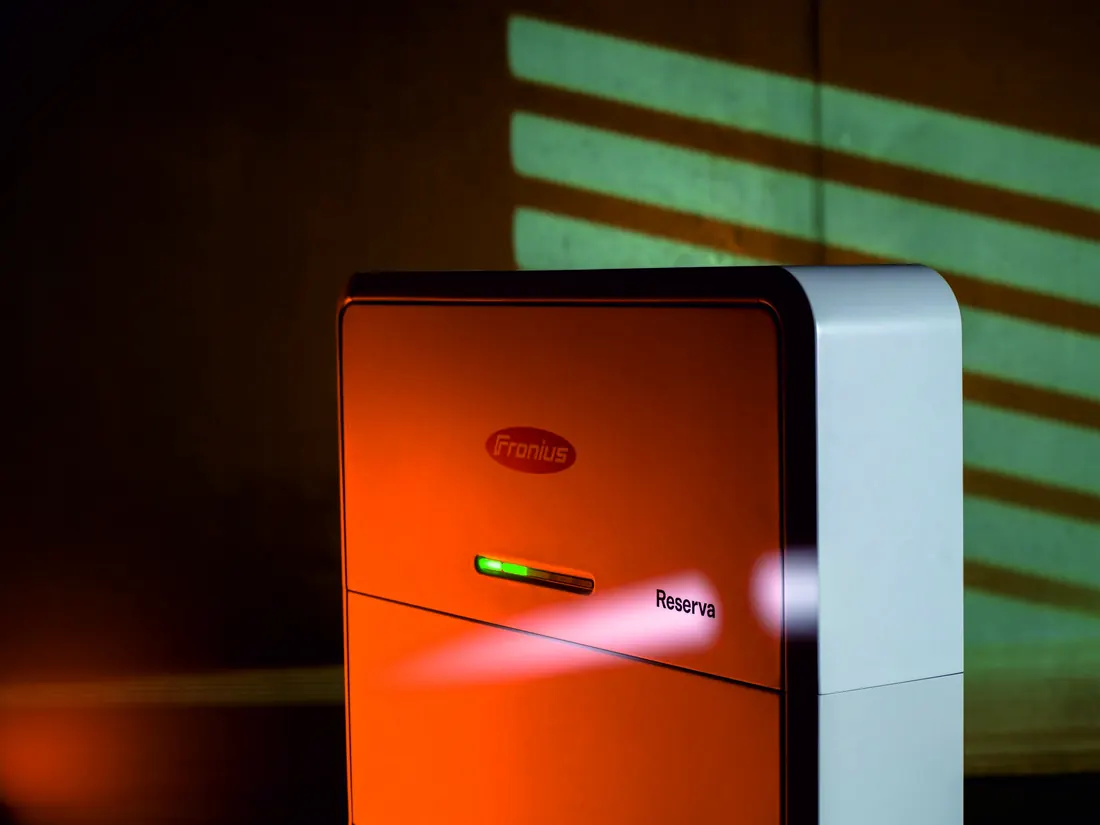 Fronius Reserva in a dark room with light through blinds
